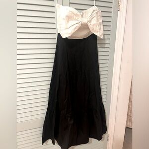 White and black strapless bow dress